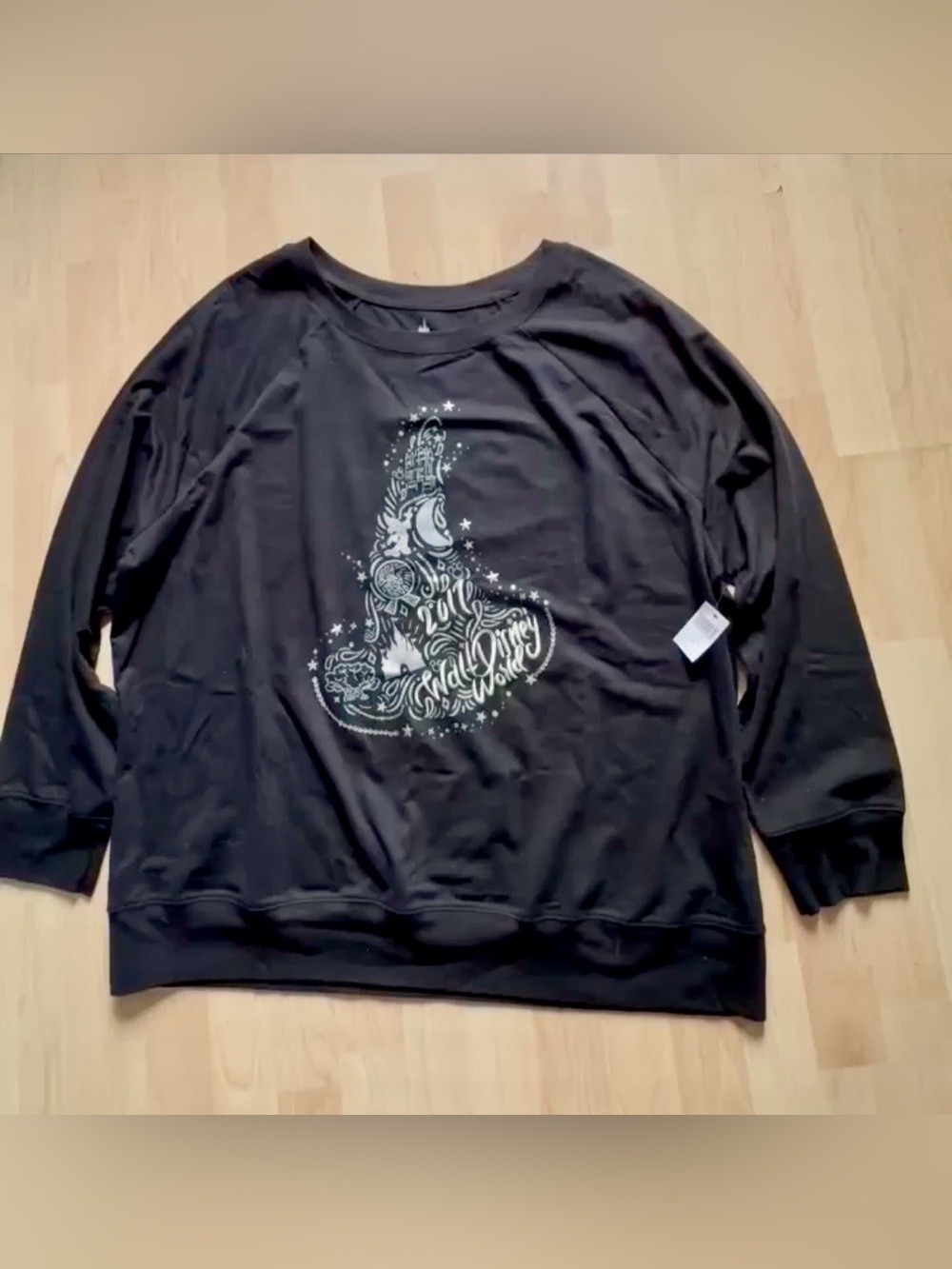 New with Tags.  Disney Parks top dated 2017.